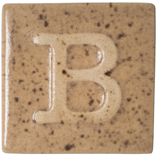 Botz Beige ceramic glaze with brown flecks, perfect for pottery and ceramic studio applications.