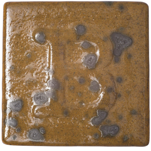 Botz Tigerauge ceramic glaze with black-green specks, ideal for pottery and ceramic painting in Dubai.
